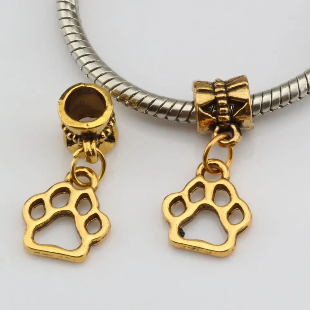 Hot Sell ! 20 pcs Antique gold Hollow Paw Print Dangle Bead Fit Charm Bracelet 11 x 25 mm (za255)
Hot Sell ! 20 pcs Antique gold Hollow Paw Print Dangle Bead Fit Charm Bracelet 11 x 25 mm (za255)