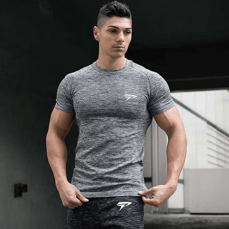 Men Compression Short sleeve T-shirt Gyms Fitness Bodybuilding t shirt Man Summer Tight Quick dry Tee Tops Jogger Brand clothing
Men Compression Short sleeve T-shirt Gyms Fitness Bodybuilding t shirt Man Summer Tight Quick dry Tee Tops Jogger Brand clothing