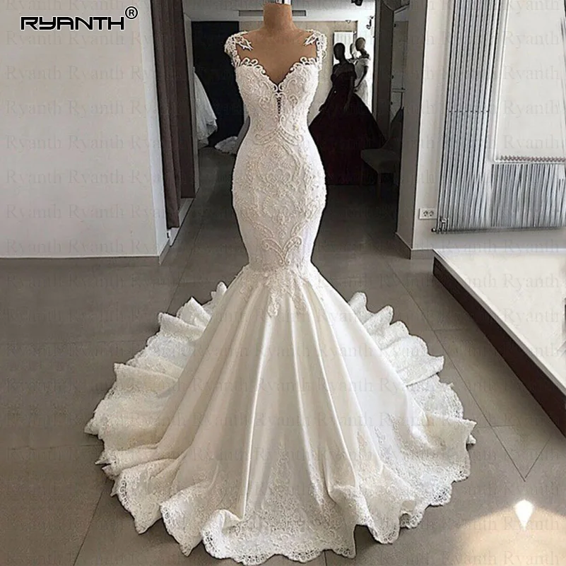 Robe De Mariee Luxury Mermaid Wedding Dresses 2023 Cap Sleeve Beaded Lace Satin Bride Wedding Gowns Dress Vestidos De Noiva
Robe De Mariee Luxury Mermaid Wedding Dresses 2023 Cap Sleeve Beaded Lace Satin Bride Wedding Gowns Dress Vestidos De Noiva