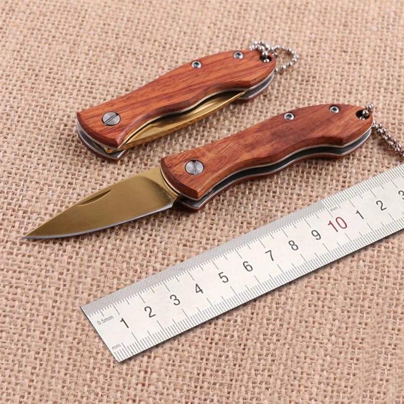 Free shipping Titanium gold Folding Knife Wood Handle Survival Tactical Pocket Knife Small Camping Knives EDC Tools
Free shipping Titanium gold Folding Knife Wood Handle Survival Tactical Pocket Knife Small Camping Knives EDC Tools