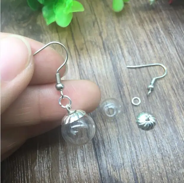 100sets 50pairs 12*3mm empty handmade ball glass globe orb with beads cap ear hook earrings set glass vial charms glass bottle
100sets 50pairs 12*3mm empty handmade ball glass globe orb with beads cap ear hook earrings set glass vial charms glass bottle