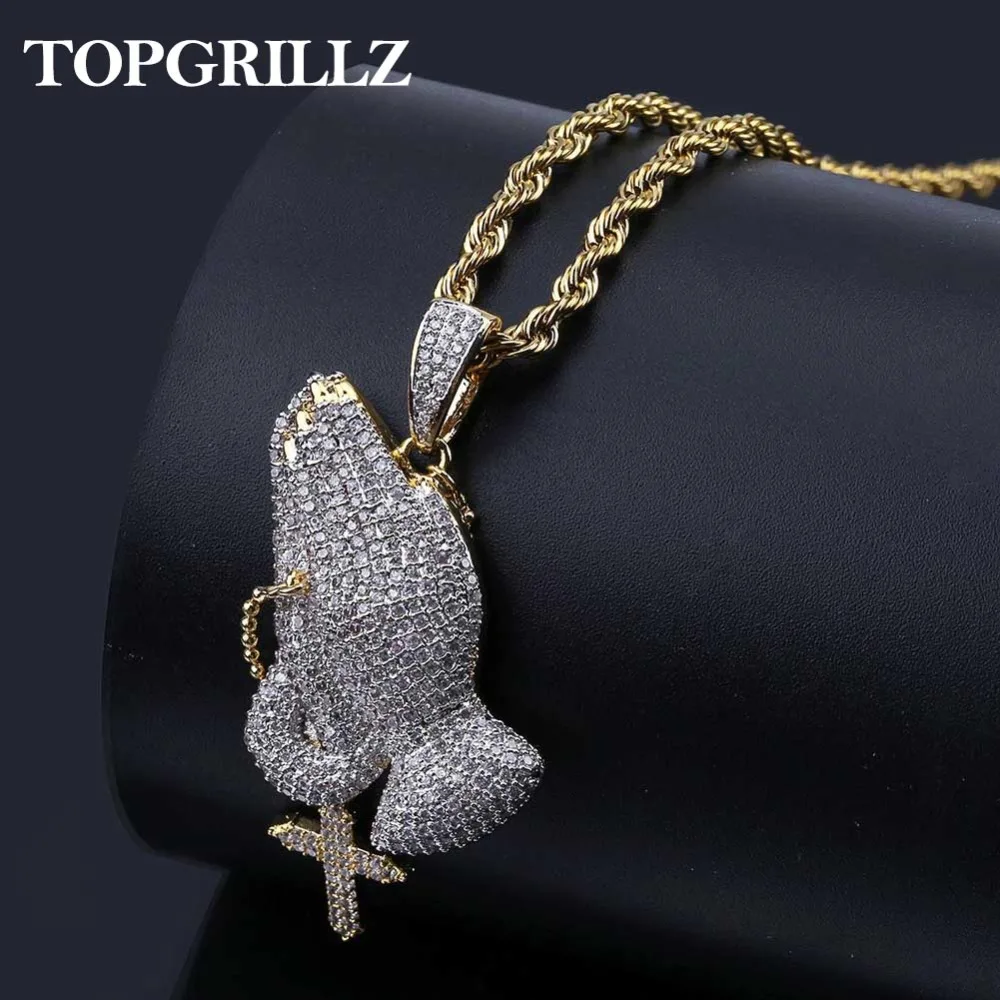 Iced Out Praying Hand Pendant Necklace With Cross Mens/Women Gold Plated Hip Hop Charm Jewelry Necklace Chain For Gifts
Iced Out Praying Hand Pendant Necklace With Cross Mens/Women Gold Plated Hip Hop Charm Jewelry Necklace Chain For Gifts