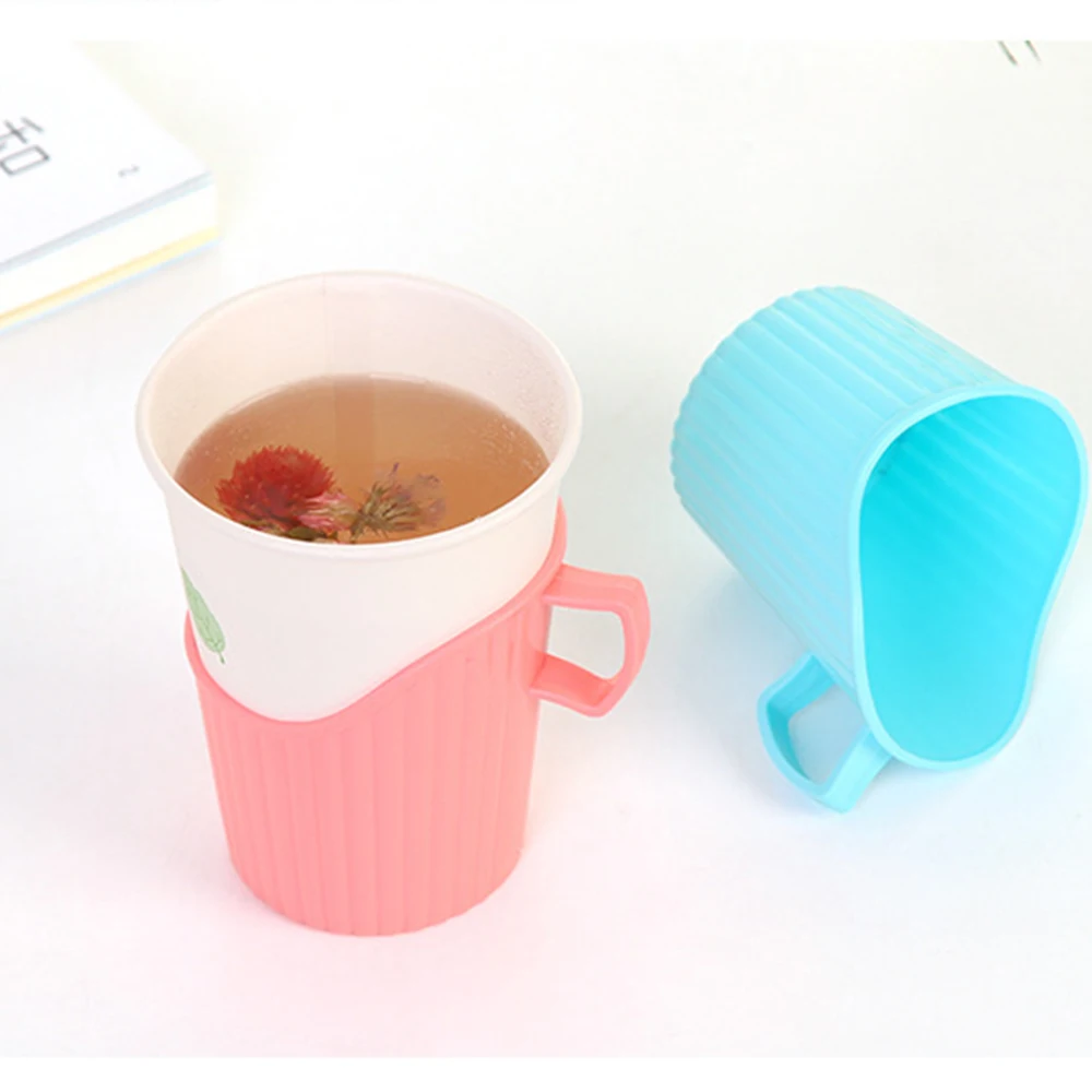 Hot Disposable Paper Cup Holder Plastic Anti-scalding Insulated Cup Holder Water Bottle Home Decor Accessories Party Supplies
Hot Disposable Paper Cup Holder Plastic Anti-scalding Insulated Cup Holder Water Bottle Home Decor Accessories Party Supplies