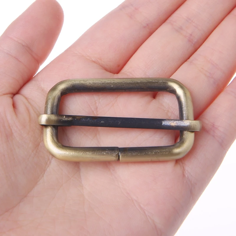 New 5pcs 38/32/25/20/50mm Strap Buckle Metal Tri-Glides Wire-Formed Roller Pin Buckles Strap Slider Adjuster Bag Accessories
New 5pcs 38/32/25/20/50mm Strap Buckle Metal Tri-Glides Wire-Formed Roller Pin Buckles Strap Slider Adjuster Bag Accessories