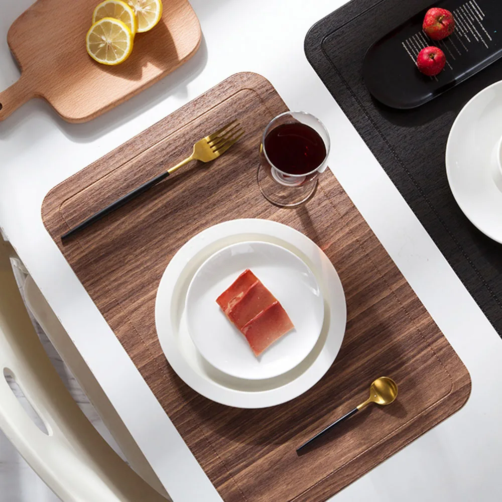Imitation Wood Grain Placemat PU Leather Pad For Dining Table Mat Heat Insulation Non Slip Placemats Bowl Coaster 45x30CM 1PCS
Imitation Wood Grain Placemat PU Leather Pad For Dining Table Mat Heat Insulation Non Slip Placemats Bowl Coaster 45x30CM 1PCS