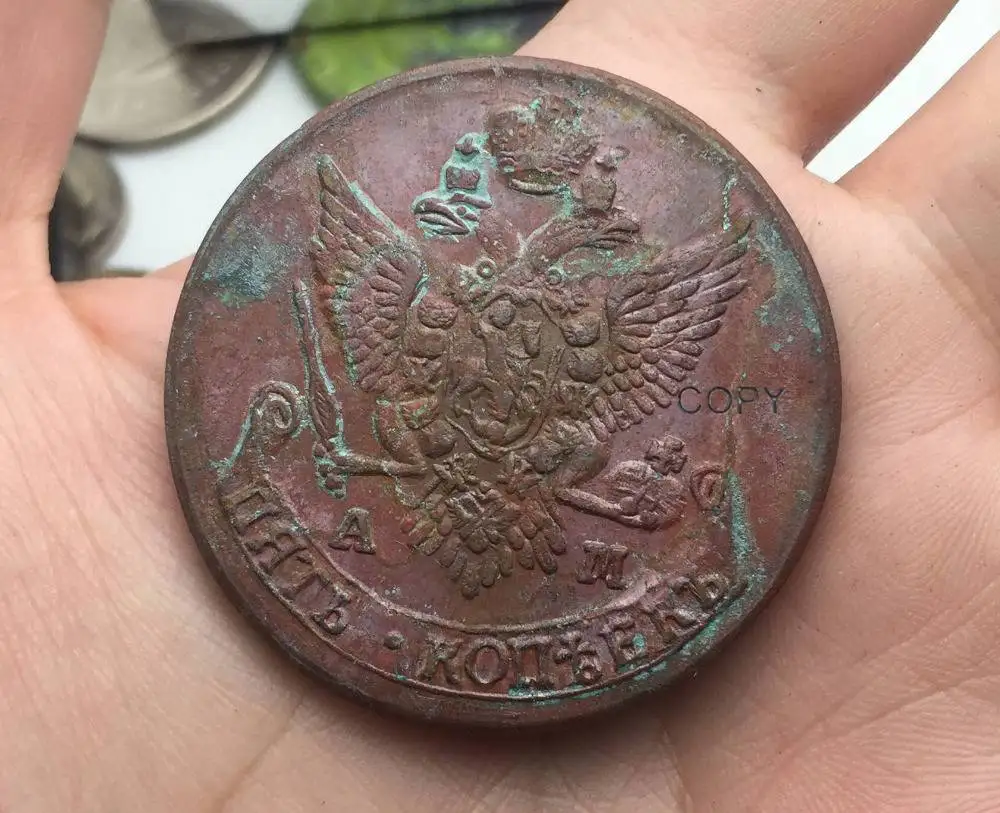 Монета российские монеты, ограниченная распродажа, копия красной меди 5 Kopeks 1789 AM
Монета российские монеты, ограниченная распродажа, копия красной меди 5 Kopeks 1789 AM