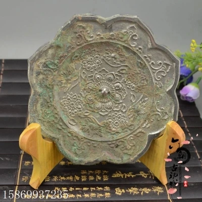 Ancient Bronze Warring States and Han Dynasty Bronze Mirror (Octagonal Sunflower)
Ancient Bronze Warring States and Han Dynasty Bronze Mirror (Octagonal Sunflower)