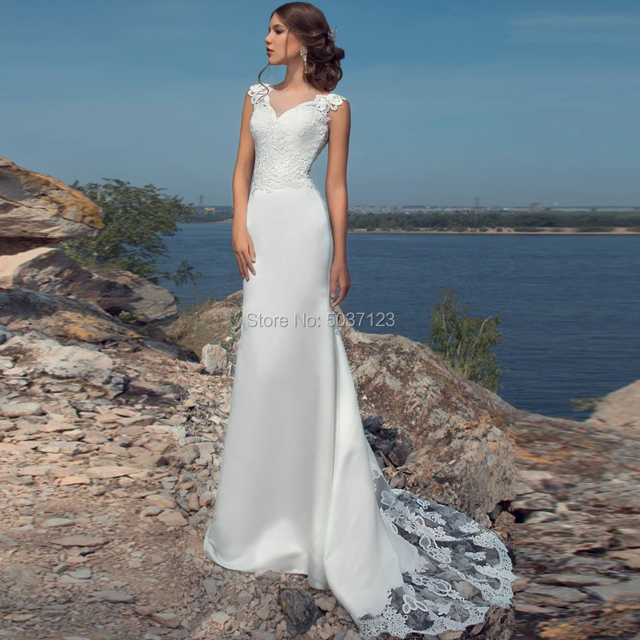 Свадебное платье-Русалка Vestido De Noiva с v-образным вырезом и кружевной аппликацией на пуговицах, без рукавов, длина до пола, свадебное платье
Свадебное платье-Русалка Vestido De Noiva с v-образным вырезом и кружевной аппликацией на пуговицах, без рукавов, длина до пола, свадебное платье