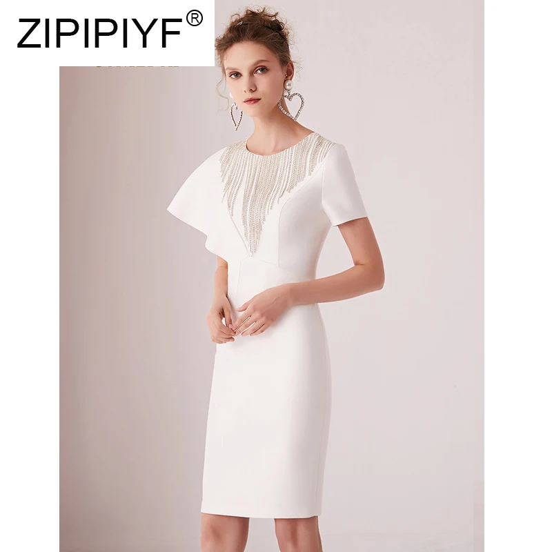 Elegant OL Diamond Tassel White Dress 2019 New Temperament Women Irregular Design Banquet Female Dress C1773
Elegant OL Diamond Tassel White Dress 2019 New Temperament Women Irregular Design Banquet Female Dress C1773