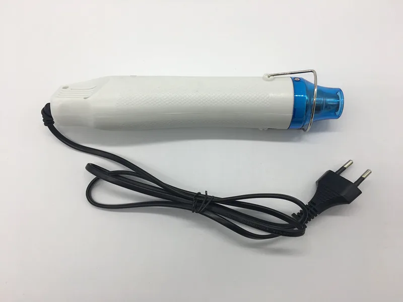 Freeshipping Electric Power Tool 220V DIY Using Heat Mini Hot Air Gun 300W Temperature Gun with Supporting Seat Shrink Plastic 
Freeshipping Electric Power Tool 220V DIY Using Heat Mini Hot Air Gun 300W Temperature Gun with Supporting Seat Shrink Plastic