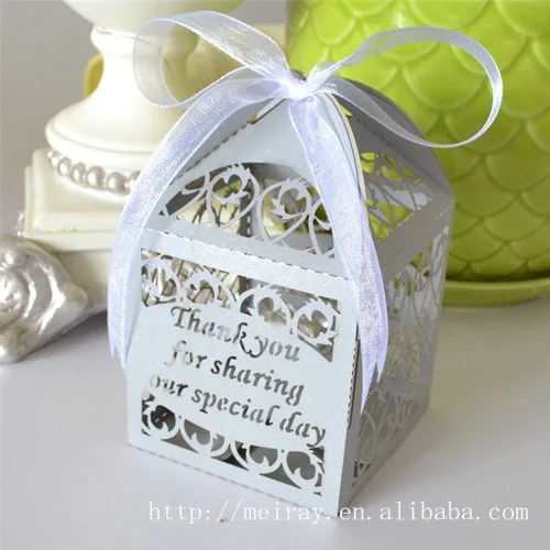 filigree favor box, silver wedding favor box, laser cut wedding favor box with white ribbons
filigree favor box, silver wedding favor box, laser cut wedding favor box with white ribbons