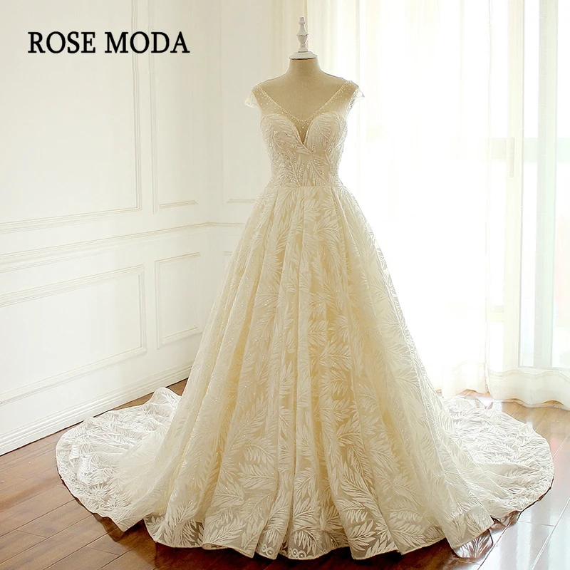 Rose Moda Luxury Lace Wedding Dress Crystal V Neck Princess Wedding Dresses with Cap Sleeves Real Photos
Rose Moda Luxury Lace Wedding Dress Crystal V Neck Princess Wedding Dresses with Cap Sleeves Real Photos