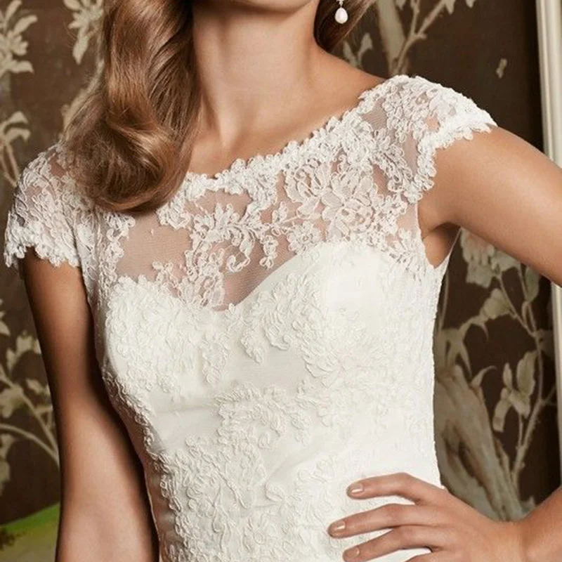 New Elegant Wedding Scoop Neck V Back Jackets Short Sleeve Lace Top White Ivory Wraps Boleros Custom Size Bridal Jacket
New Elegant Wedding Scoop Neck V Back Jackets Short Sleeve Lace Top White Ivory Wraps Boleros Custom Size Bridal Jacket