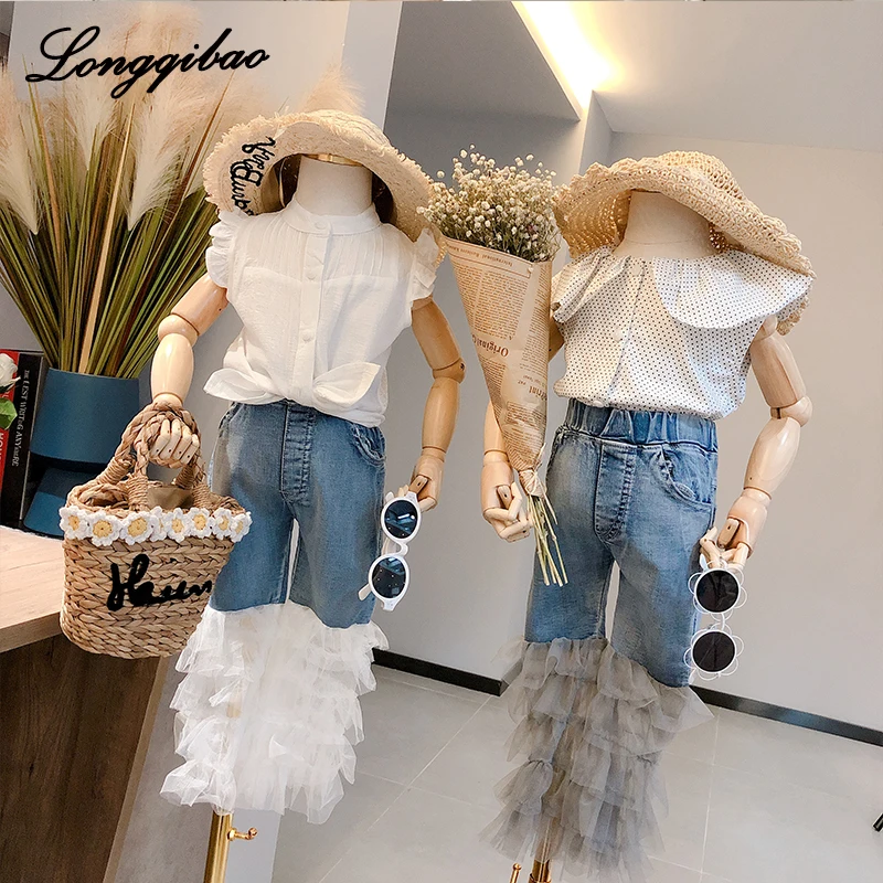 Baby girl ruffle pants2021 new spring and summer girls personality denim stitching white lace trousers female baby jeans summer
Baby girl ruffle pants2021 new spring and summer girls personality denim stitching white lace trousers female baby jeans summer