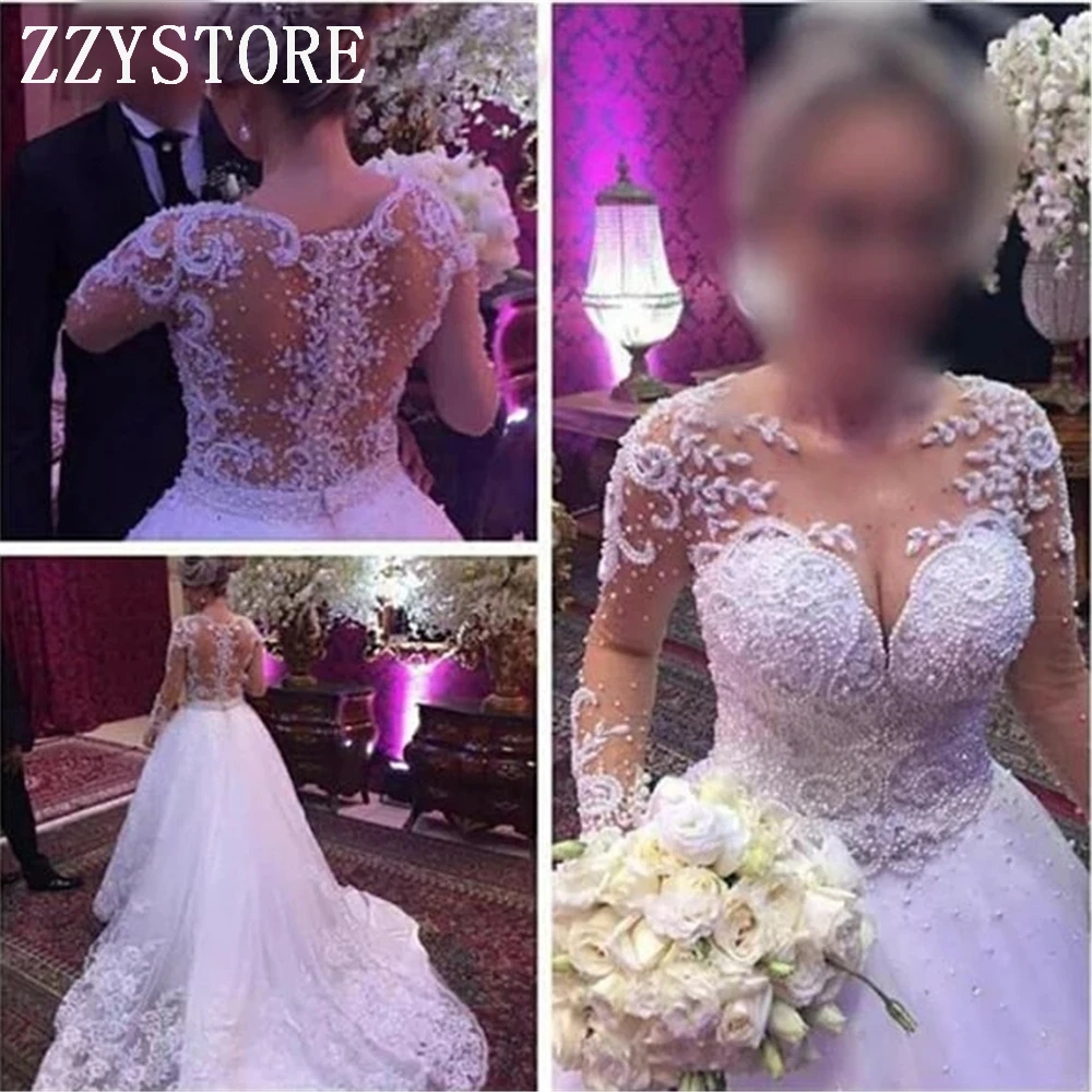 O-neck Illusion Beading Pearls Court Train Custom-Made Newest White Heavy Handworks Court Train Arabic White wedding dresses
O-neck Illusion Beading Pearls Court Train Custom-Made Newest White Heavy Handworks Court Train Arabic White wedding dresses