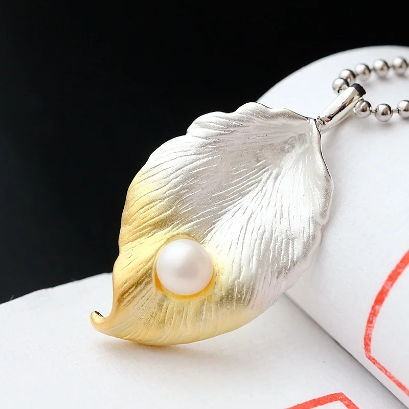 Retro Thai Silver Wholesale S925 Sterling Silver With Natural Pearl Pendant Handmade Vintage Silver Leaf Female Silver Pendant
Retro Thai Silver Wholesale S925 Sterling Silver With Natural Pearl Pendant Handmade Vintage Silver Leaf Female Silver Pendant