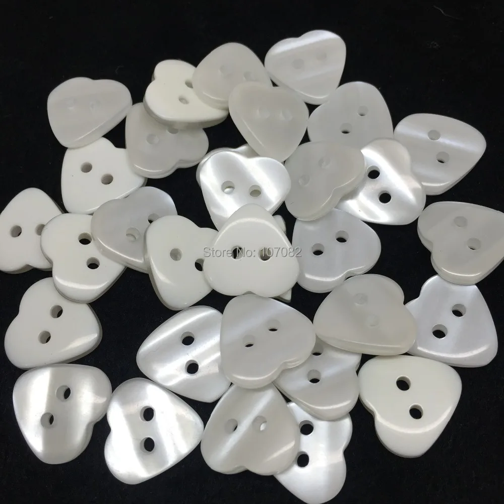 300pcs/lot 12X13mm Pearl White Shiny Heart Resin Buttons 2 Holes Baby Sewing Accessories Scrapbooking Cardmaking Embellishments
300pcs/lot 12X13mm Pearl White Shiny Heart Resin Buttons 2 Holes Baby Sewing Accessories Scrapbooking Cardmaking Embellishments