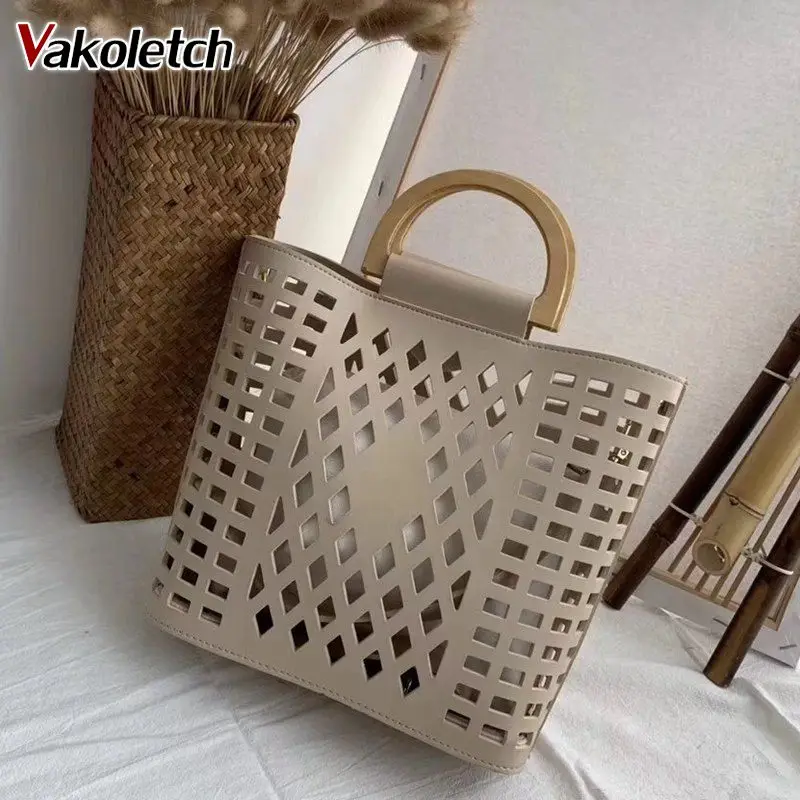 Wood handle tote bags PU leather shoulder bag Purses Women Bags Handbags 2022 Famous Brands Hollow Out Beach Bag Bolsa KL645
Wood handle tote bags PU leather shoulder bag Purses Women Bags Handbags 2022 Famous Brands Hollow Out Beach Bag Bolsa KL645