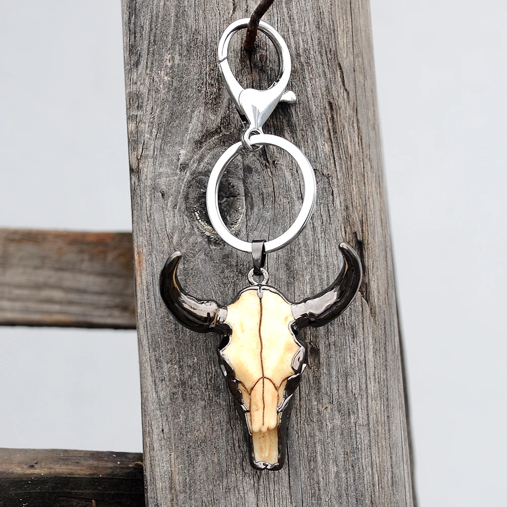 Artilady bull head keychain keyring snake key ring angel holder for men accessory jewelry gift
Artilady bull head keychain keyring snake key ring angel holder for men accessory jewelry gift