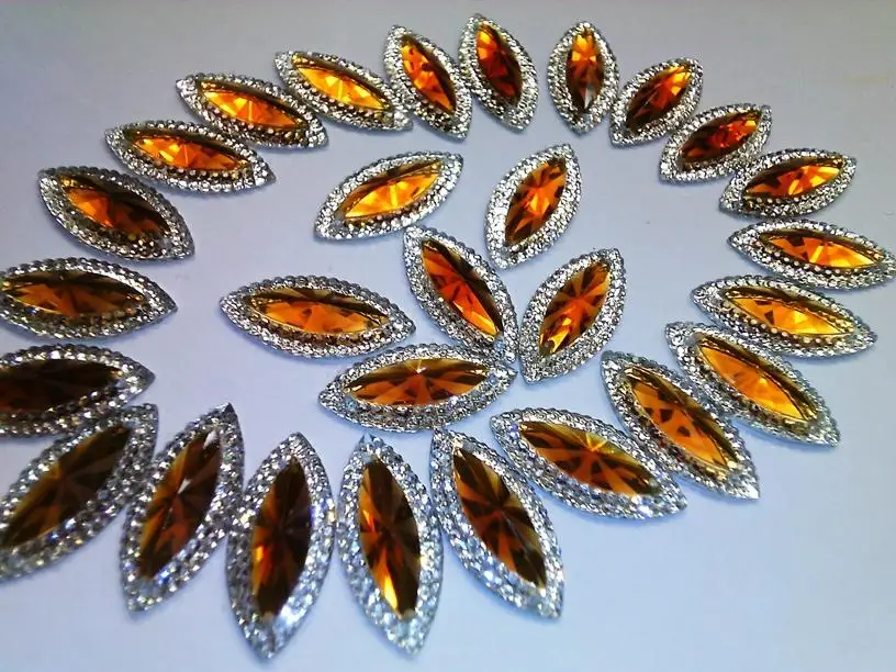 Sew on stones Rhinestones Navette shape flatback 11*24mm Coffon colour beads resin gemstones for dress 60pcs/lot
Sew on stones Rhinestones Navette shape flatback 11*24mm Coffon colour beads resin gemstones for dress 60pcs/lot