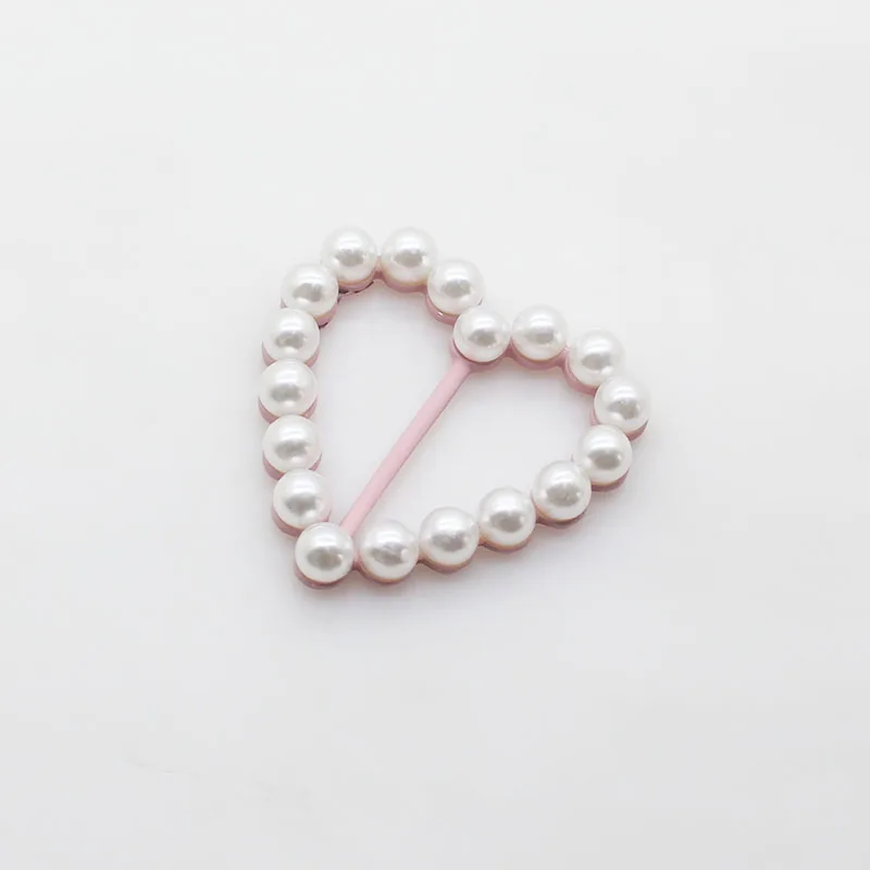 Creative 5pcs Apparel Heart Ribbon bucklef pearl Wild high-end clothing corner knot buckle Shirt hem Simple decorative buckle
Creative 5pcs Apparel Heart Ribbon bucklef pearl Wild high-end clothing corner knot buckle Shirt hem Simple decorative buckle