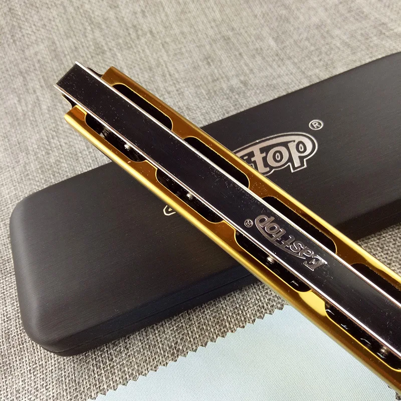Hardcover EASTTOP the 24 hole harmonica in the east C silver (gold) professional play the harmonica
Hardcover EASTTOP the 24 hole harmonica in the east C silver (gold) professional play the harmonica