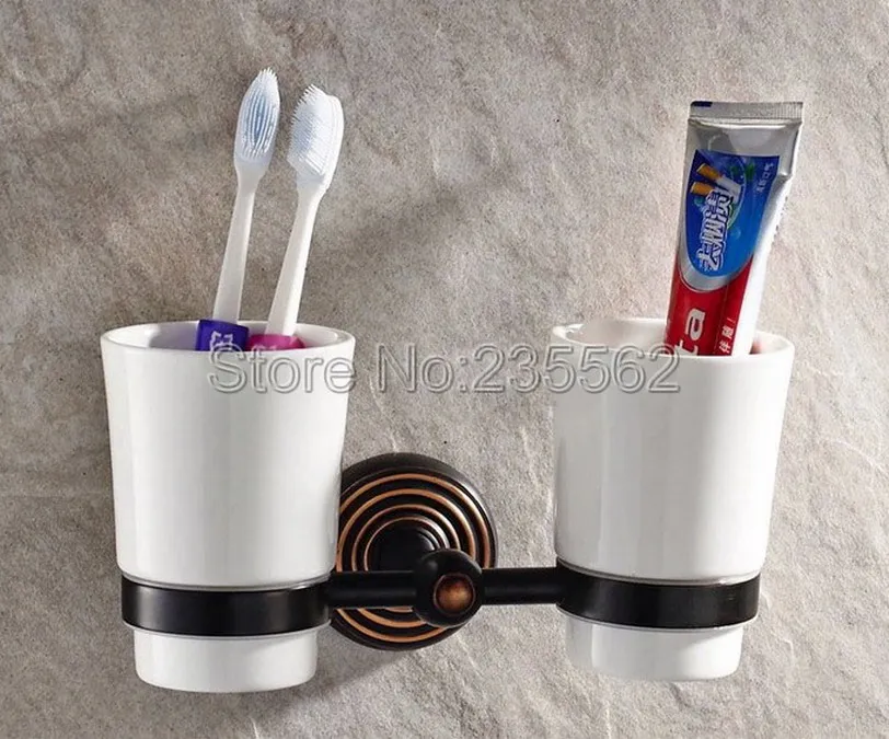 Wall Mounted Bathroom Double Cup Holders Black Oil Rubbed Brass Finish Toothbrush Holders with Ceramic Cups lba188a
Wall Mounted Bathroom Double Cup Holders Black Oil Rubbed Brass Finish Toothbrush Holders with Ceramic Cups lba188a