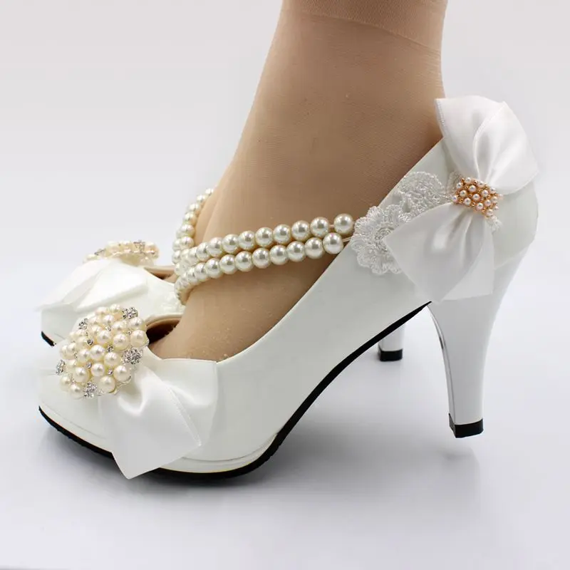 White bow butterfly-knot wedding pumps shoes woman NQ209 heel 8CM string beads beading elastic band crystal pearls bridal shoe
White bow butterfly-knot wedding pumps shoes woman NQ209 heel 8CM string beads beading elastic band crystal pearls bridal shoe