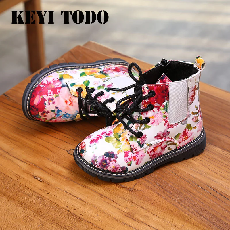 New autumn/Winter Girl Martin Boots printed shredded flower boots girls casual shoes children lacquer leather child boots B157
New autumn/Winter Girl Martin Boots printed shredded flower boots girls casual shoes children lacquer leather child boots B157