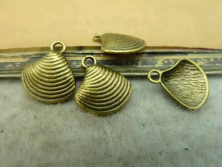 100pcs 12*14mm ancient bronze seashell pendants Wholesale DIY accessories vintage metal alloy
100pcs 12*14mm ancient bronze seashell pendants Wholesale DIY accessories vintage metal alloy
