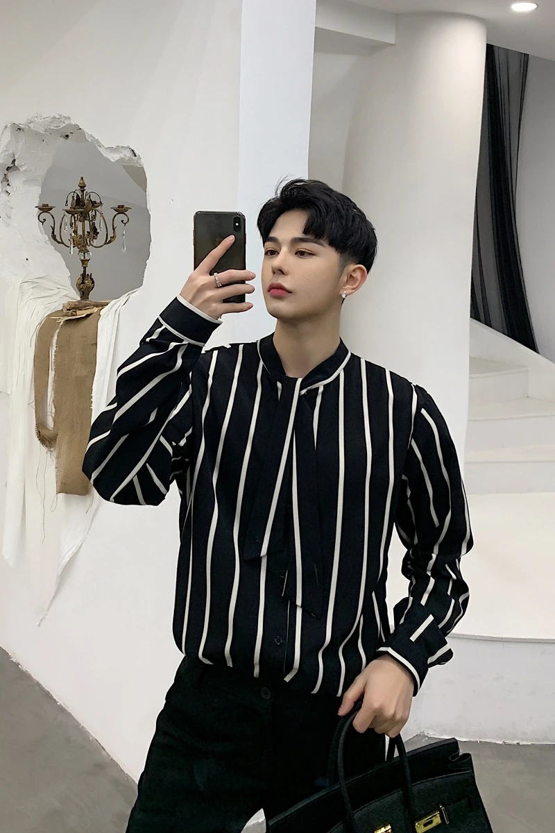Spring designer black and white stripe loose show thin long-sleeved shirt popular logo men's tie decoration shirt
Spring designer black and white stripe loose show thin long-sleeved shirt popular logo men's tie decoration shirt