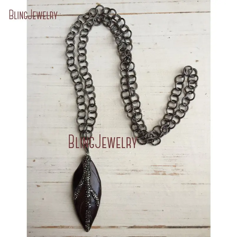 Pave Gunmetal Crystal Cattle Leaf Pendant Necklace On Gunmetal Large Textured Chain NM18692
Pave Gunmetal Crystal Cattle Leaf Pendant Necklace On Gunmetal Large Textured Chain NM18692