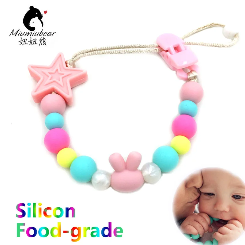 Cute rabbit head shaped silicon pacifier clip chewable food-grade beads holder toy chain teether anti-drop leash BPA free
Cute rabbit head shaped silicon pacifier clip chewable food-grade beads holder toy chain teether anti-drop leash BPA free