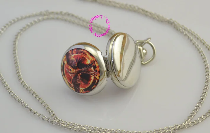 fashion game 3 three the hunger games pocket watch quartz silver lady girl woman analog round with chain nekclace antibrittle
fashion game 3 three the hunger games pocket watch quartz silver lady girl woman analog round with chain nekclace antibrittle