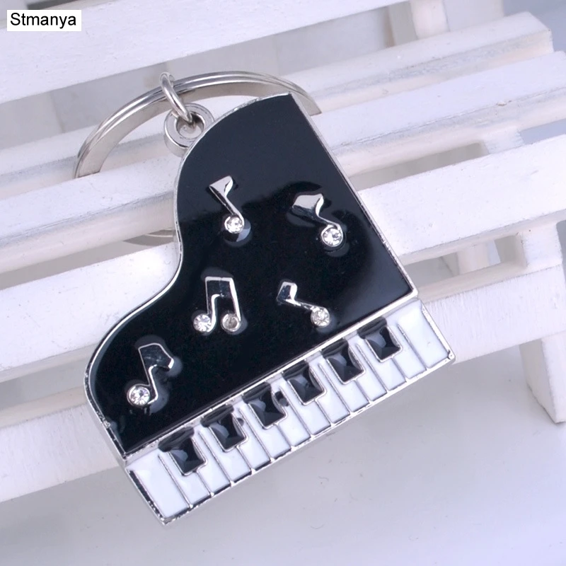 Hot Men Popular Piano key chain New metal Keychain with Crystal Business gift car key ring party gift Jewelry K2020
Hot Men Popular Piano key chain New metal Keychain with Crystal Business gift car key ring party gift Jewelry K2020