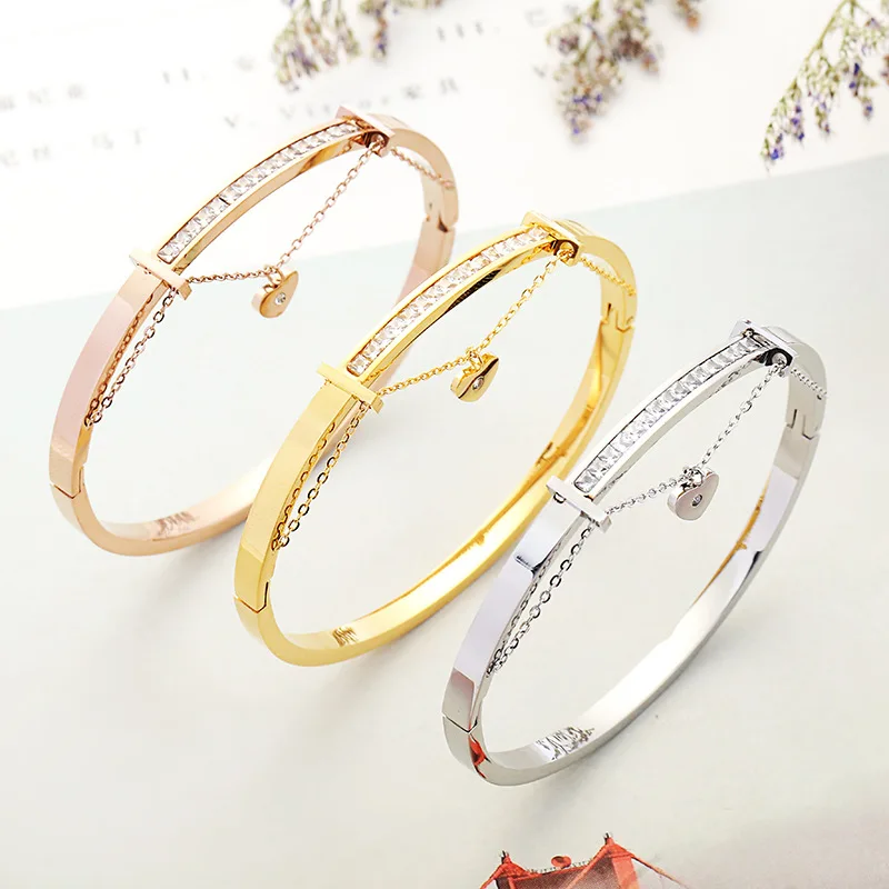 Hot Sale Rhinestone CZ With Heart Charm Rose Gold Color / Silver Color / Gold Color Stainless Steel Bangle
Hot Sale Rhinestone CZ With Heart Charm Rose Gold Color / Silver Color / Gold Color Stainless Steel Bangle