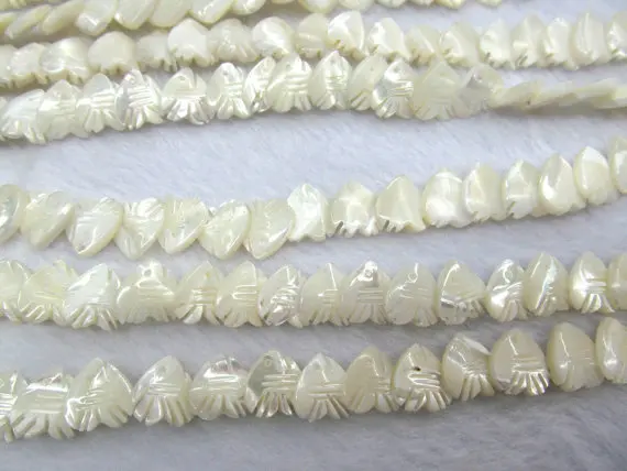 wholesale 2strands 12mm Genuine MOP Shell ,Pearl Shell beads ,heart,fish carved white spacer bead
wholesale 2strands 12mm Genuine MOP Shell ,Pearl Shell beads ,heart,fish carved white spacer bead