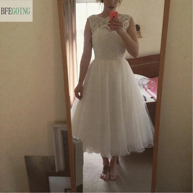 Ivory Tulle Lace Mid-Calf A-line Wedding Dresses Sleeveless Real/Original Photos Custom made
Ivory Tulle Lace Mid-Calf A-line Wedding Dresses Sleeveless Real/Original Photos Custom made