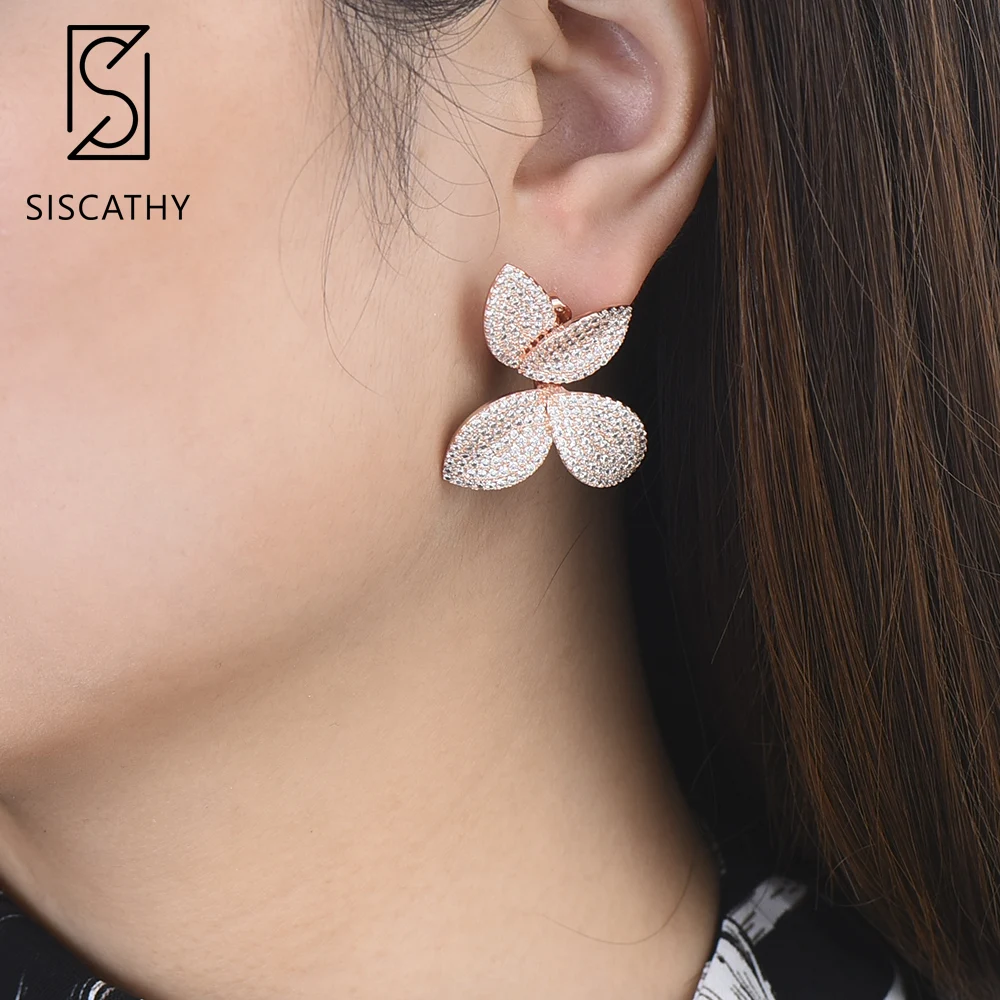 SisCathy 27*26mm Fashion Women Earrings Flower Leaf Layers Full Cubic Zirconia Inlaid Dubai wedding Engagement Stud Earrings
SisCathy 27*26mm Fashion Women Earrings Flower Leaf Layers Full Cubic Zirconia Inlaid Dubai wedding Engagement Stud Earrings
