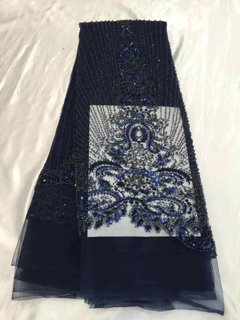 Bridal french lace fabric beaded african tulle lace fabric tassel lace with sequenc 5 yards per lot net lace fabric for dress .
Bridal french lace fabric beaded african tulle lace fabric tassel lace with sequenc 5 yards per lot net lace fabric for dress .