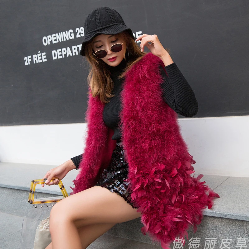 Women spring autumn winter real turkey feather vest ostrich feather waistcoat medium long V-neck female
Women spring autumn winter real turkey feather vest ostrich feather waistcoat medium long V-neck female