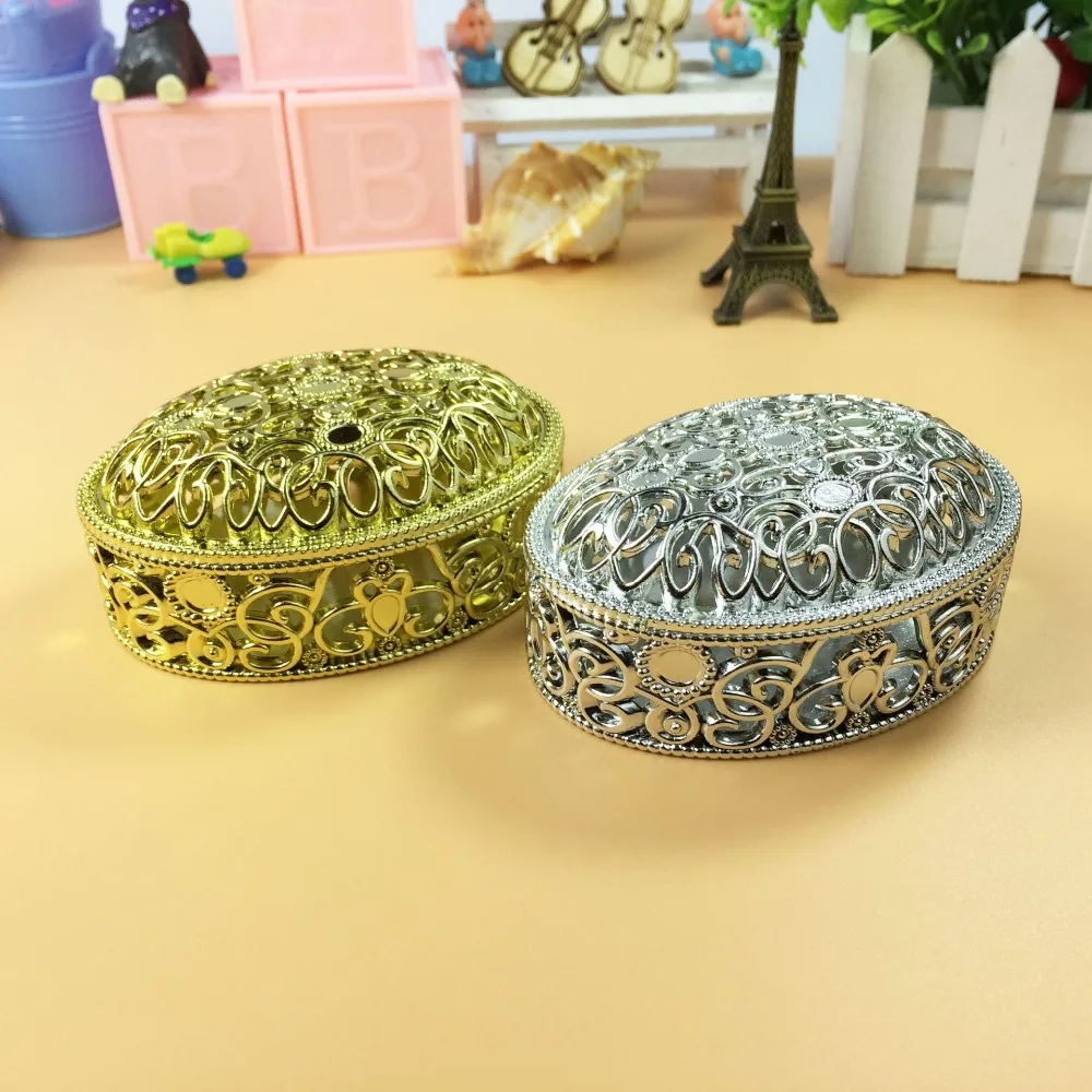 new creative gift boxes personality candy Box Ellipse hollow Electroplated sugar box Gold and Silver Plastic favor Box
new creative gift boxes personality candy Box Ellipse hollow Electroplated sugar box Gold and Silver Plastic favor Box