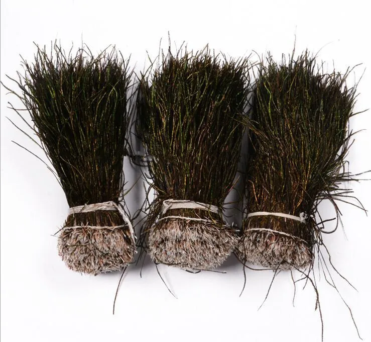 1roll Natural Peacock Feathers Trimming feather strip Peacock tail feather fishing tying for dress decoration 15-20cm
1roll Natural Peacock Feathers Trimming feather strip Peacock tail feather fishing tying for dress decoration 15-20cm