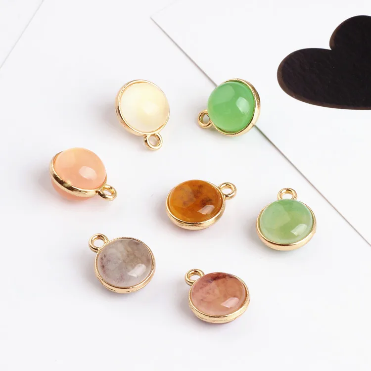 50PCS/Lot 14*17MM Gold Tone Cat Eye Stone Decorated Round Alloy Jewelry Charms Pendant Simple Korea Style Necklace Pendant
50PCS/Lot 14*17MM Gold Tone Cat Eye Stone Decorated Round Alloy Jewelry Charms Pendant Simple Korea Style Necklace Pendant