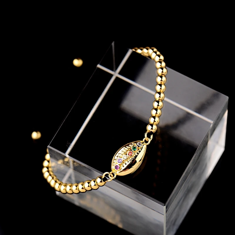 OIQUEI CZ Puka Shell Bracelet For Women Men 4MM Gold Copper Beads Charms Braided Bracelets Bohemian Summer Beach Jewelry 2019
OIQUEI CZ Puka Shell Bracelet For Women Men 4MM Gold Copper Beads Charms Braided Bracelets Bohemian Summer Beach Jewelry 2019