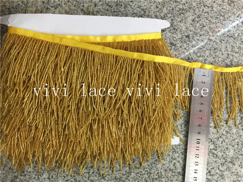 yy026 new 10 yards gold tense short beads ribbon tassel fringe 5-8 cm width for decoration dress/fashion designer
yy026 new 10 yards gold tense short beads ribbon tassel fringe 5-8 cm width for decoration dress/fashion designer