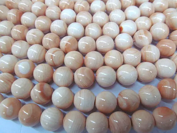 16mm 16inch top quality camero conch natural queen shell gergous round ball yellow charm bead
16mm 16inch top quality camero conch natural queen shell gergous round ball yellow charm bead