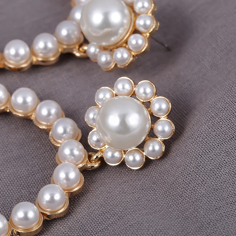 AENSOA Trendy Crystal Round Pendant Drop Earrings for Women Fashion Pearl Charm Statement Jewelry Wedding Earrings Female 2021
AENSOA Trendy Crystal Round Pendant Drop Earrings for Women Fashion Pearl Charm Statement Jewelry Wedding Earrings Female 2021