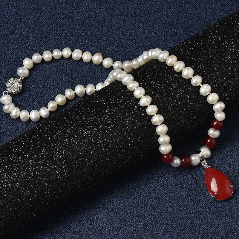 The 8-9 mm water Natural Pearl Necklace with Four translucent red balls connected with a bright red droplet 16*26*8 mm Pend
The 8-9 mm water Natural Pearl Necklace with Four translucent red balls connected with a bright red droplet 16*26*8 mm Pend