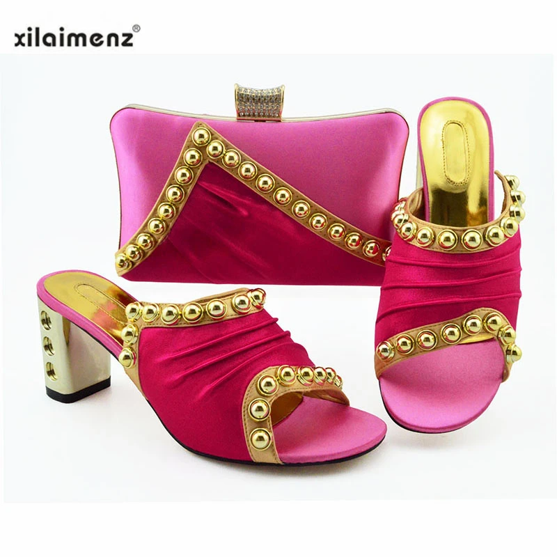 New Fuchsia Color Shoes and Bag Set Italian Sets 2019 Slippers and Purse To Match Mid Heels Pumps with Rivet for Wedding
New Fuchsia Color Shoes and Bag Set Italian Sets 2019 Slippers and Purse To Match Mid Heels Pumps with Rivet for Wedding